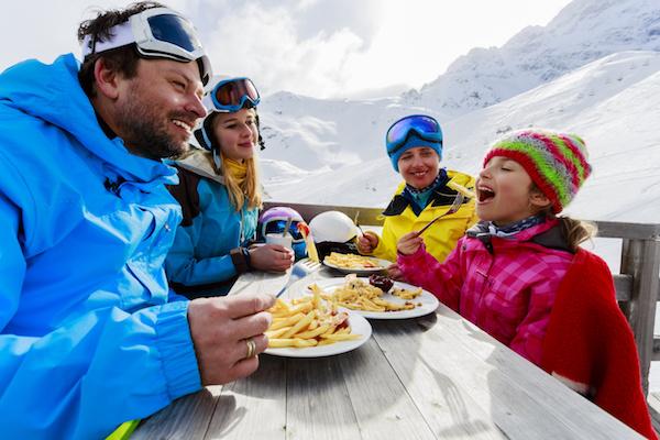 family eating food during lunch